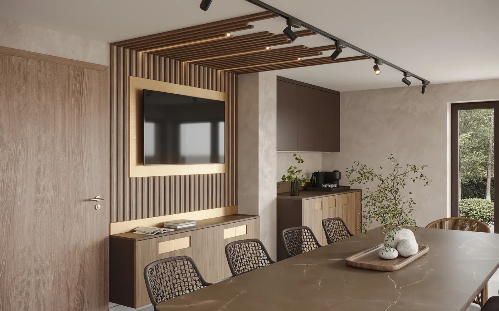 The spacious communal lounge at Völgy Residence with a large dining table